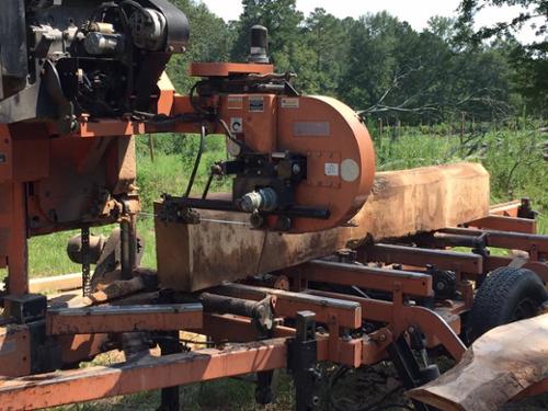 Sawmill lumber being milled from the property for the bridge construction. 